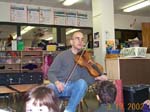 [The violist plays for the class.]