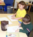 [Making observational drawings of a drum from Africa.]